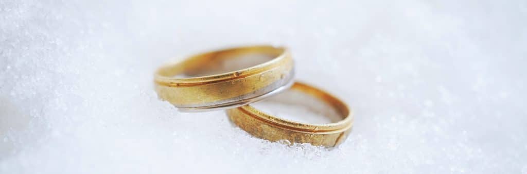 wedding-rings-on-snow-2022-09-21-18-22-11-utc