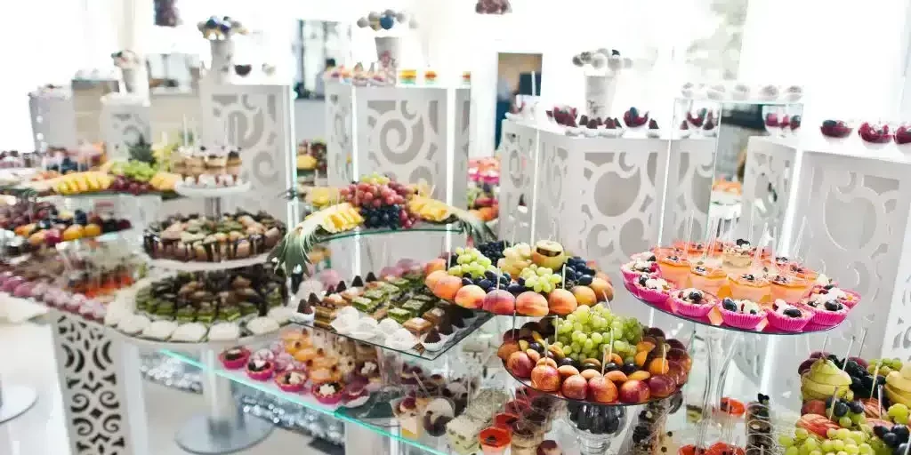 beautiful-wedding-candy-bar-with-sweets-fruits-an-2022-08-15-23-14-32-utc-1024x681